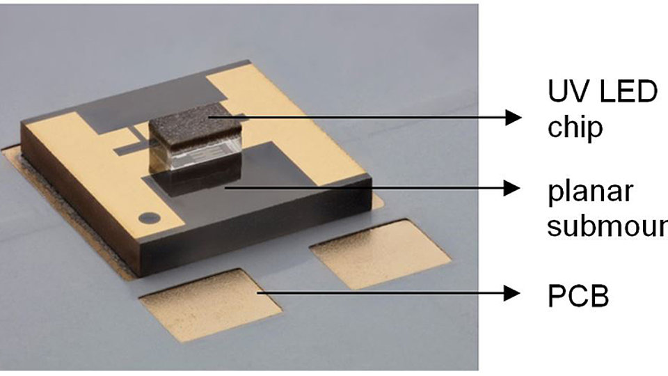 UV-B LED chip after flip-chip soldering on a planar submount for SMD mounting