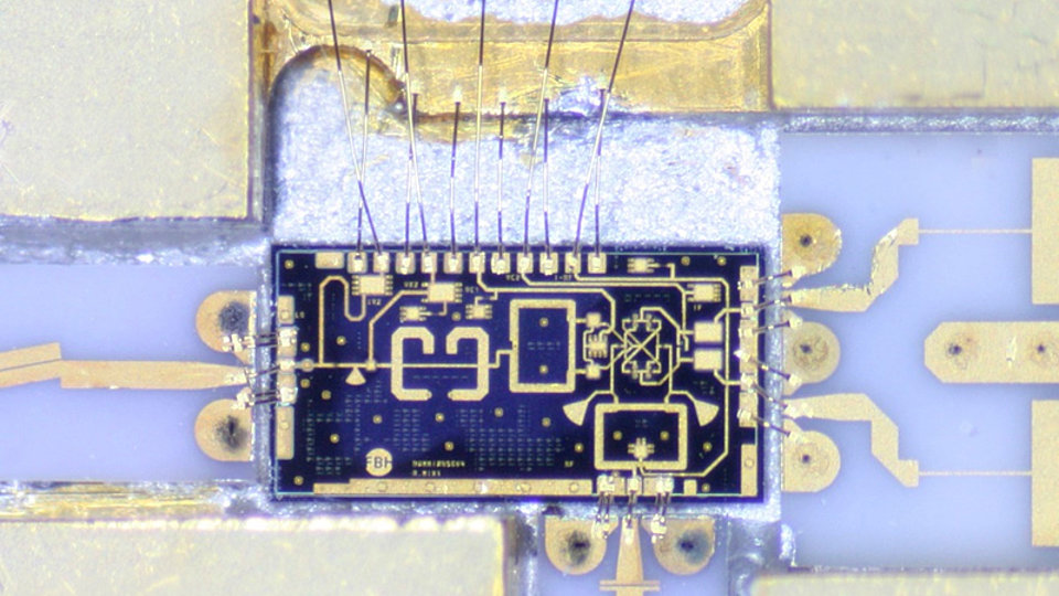 InP MMIC with TSVs mounted in a 95 GHz radar module using a bond wire transition